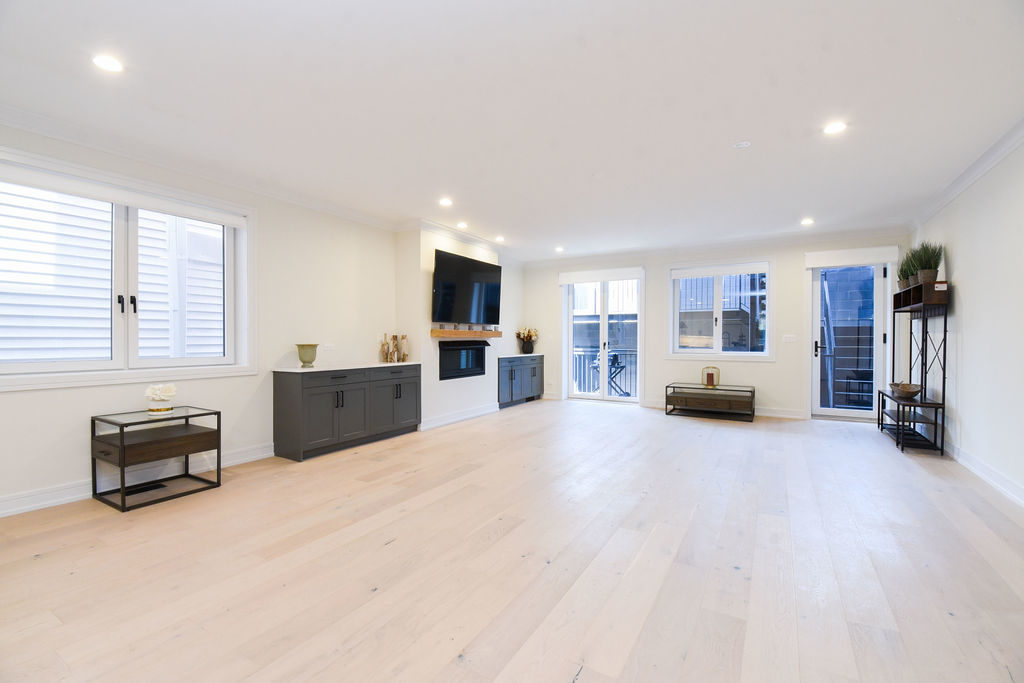 Undisclosed Address Chicago, IL 60613 - Photo 15 of 50 a large room with furniture and a wooden floors