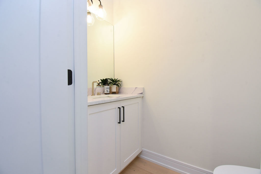 Undisclosed Address Chicago, IL 60613 - Photo 20 of 50 a bathroom with a sink vanity and toilet