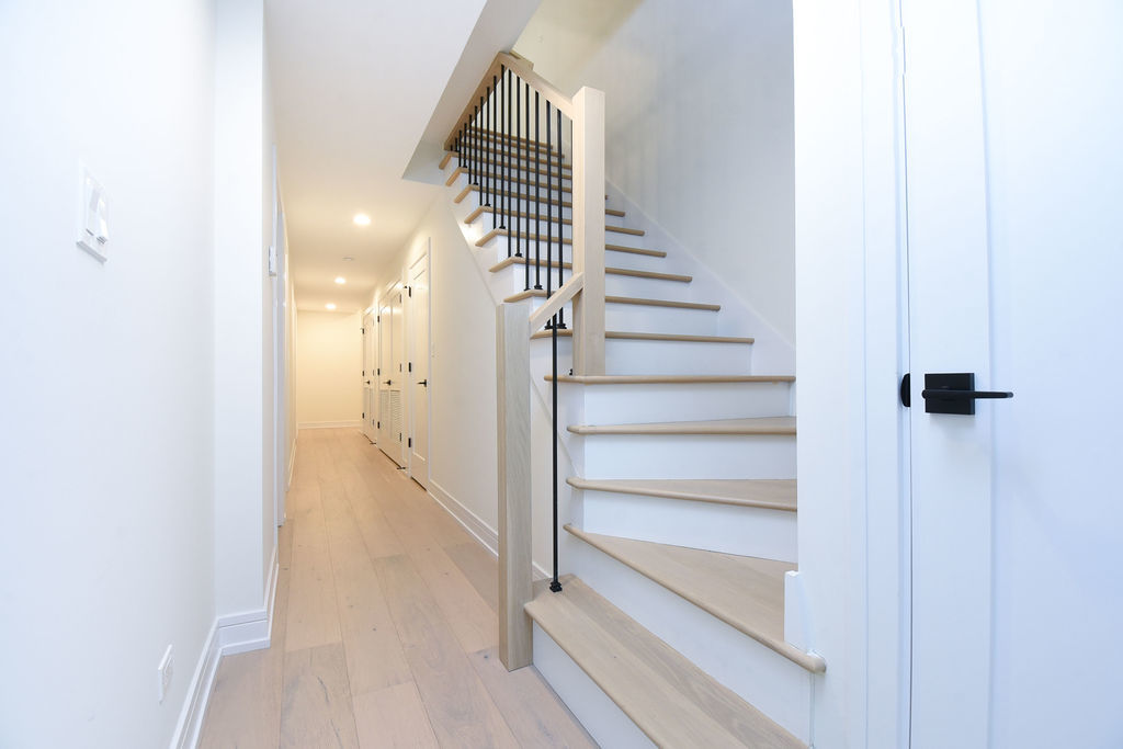 Undisclosed Address Chicago, IL 60613 - Photo 22 of 50 a view of a hallway with wooden floor and entryway