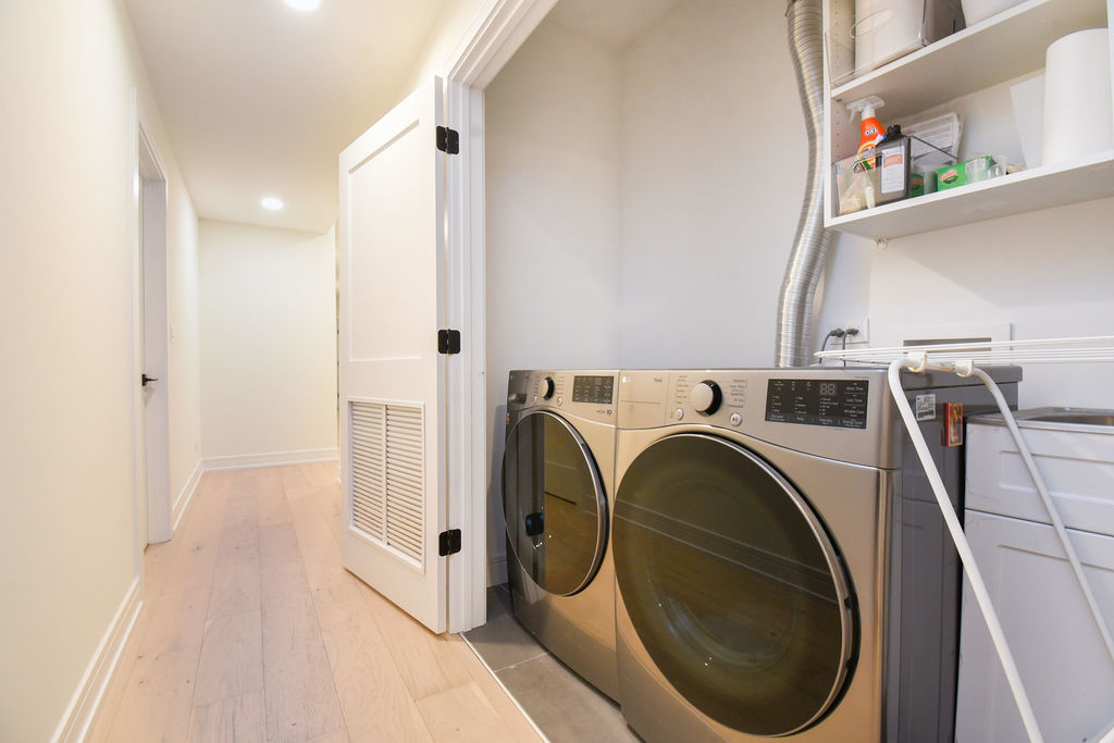 Undisclosed Address Chicago, IL 60613 - Photo 33 of 50 a utility room with dryer and washer