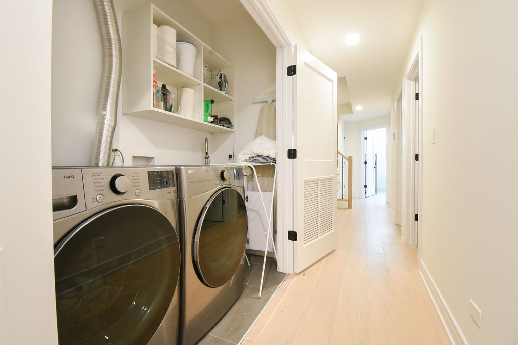 Undisclosed Address Chicago, IL 60613 - Photo 34 of 50 a utility room with dryer and washer
