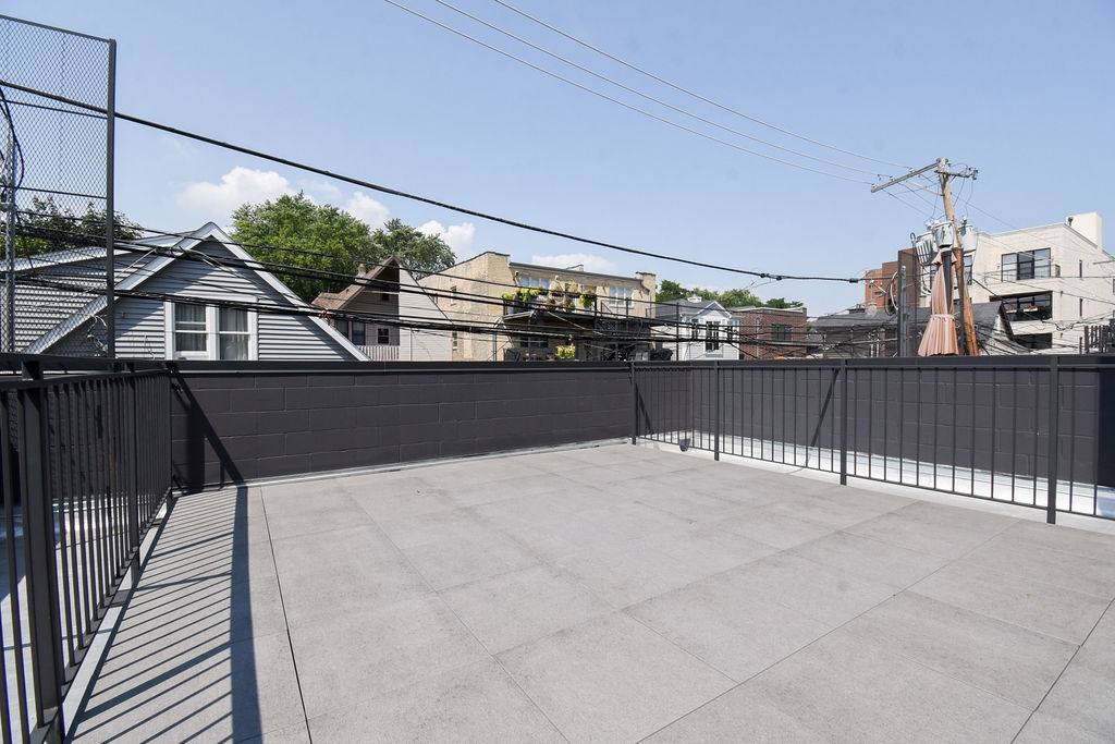 Undisclosed Address Chicago, IL 60613 - Photo 43 of 50 a house view with a outdoor space