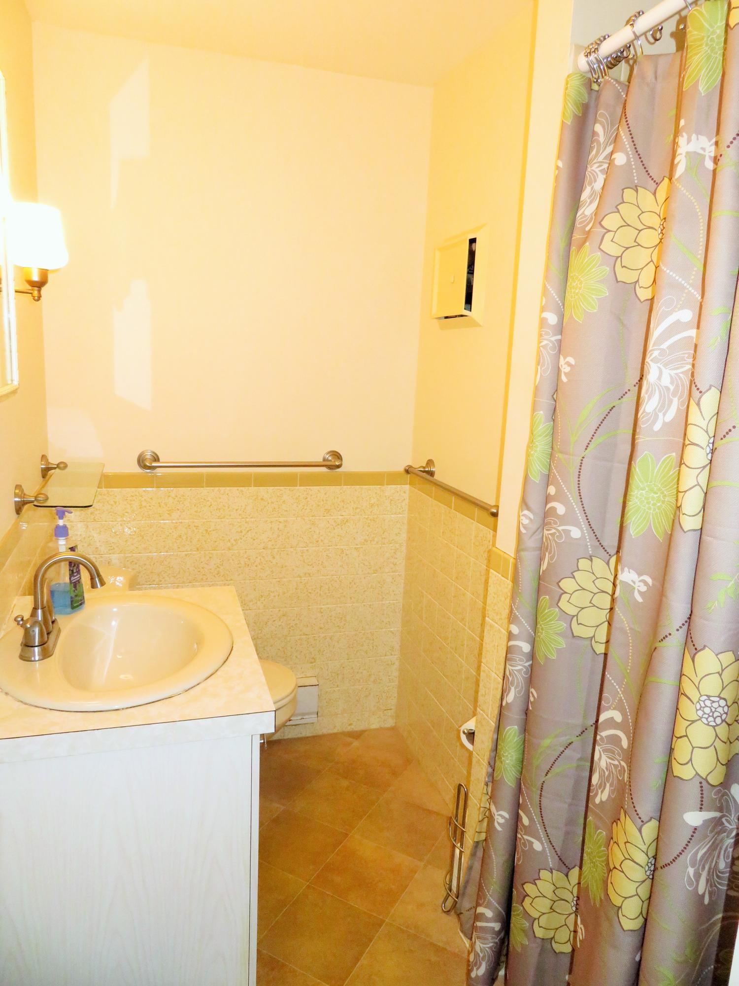 112 Old Wharf Road, Unit W9 Dennis Port, MA 02639 - Photo 11 of 19 a bathroom with a sink and a mirror