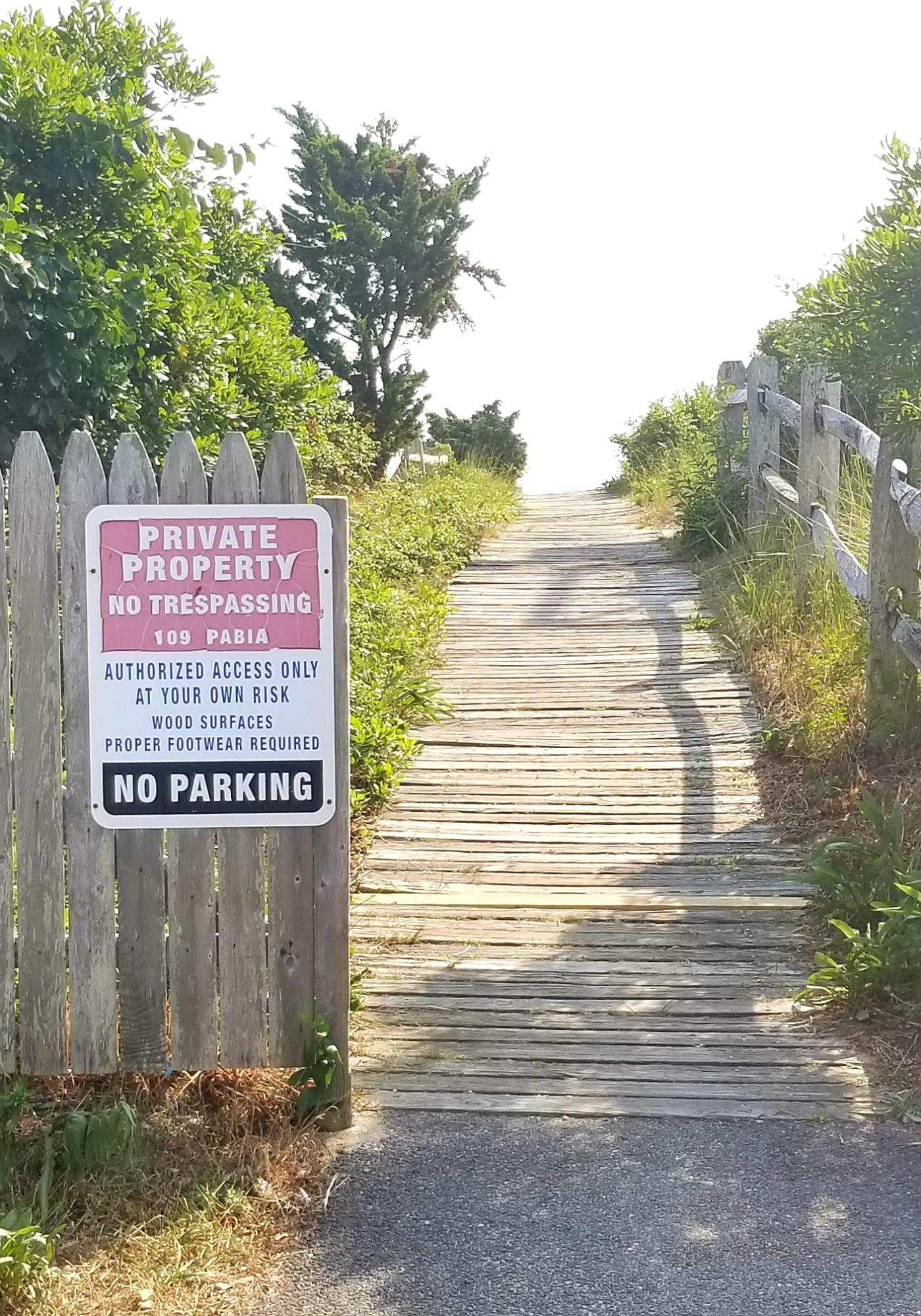 112 Old Wharf Road, Unit W9 Dennis Port, MA 02639 - Photo 19 of 19 a sign that is on the side of a building