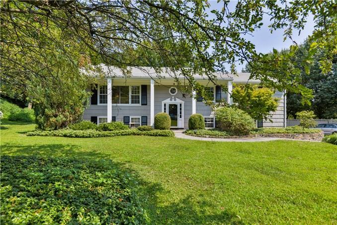 4 Sasqua Road Norwalk, CT 06855 - Photo 1 of 1 a front view of house with yard and green space