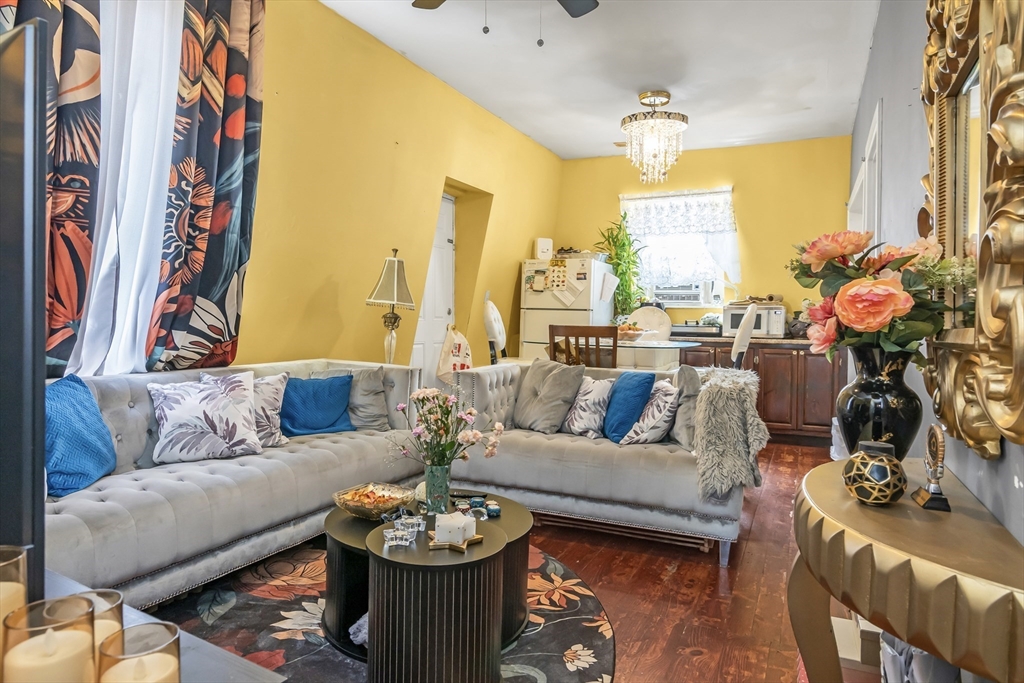191 Farnham Street Lawrence, MA 01843 - Photo 20 of 31 a living room with furniture and a large window