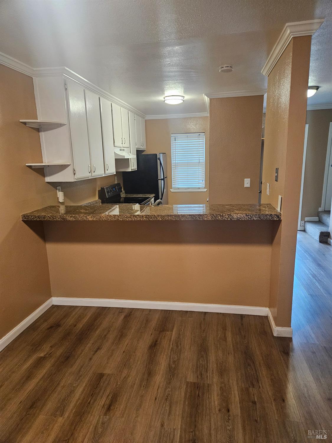1702 Glenbrook Drive, Unit D Santa Rosa, CA 95401 - Photo 2 of 7 a view of a kitchen with wooden floor