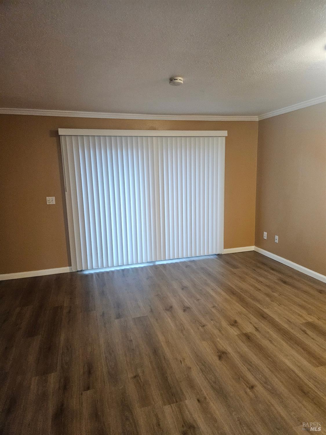 1702 Glenbrook Drive, Unit D Santa Rosa, CA 95401 - Photo 5 of 7 a view of an empty room with wooden floor