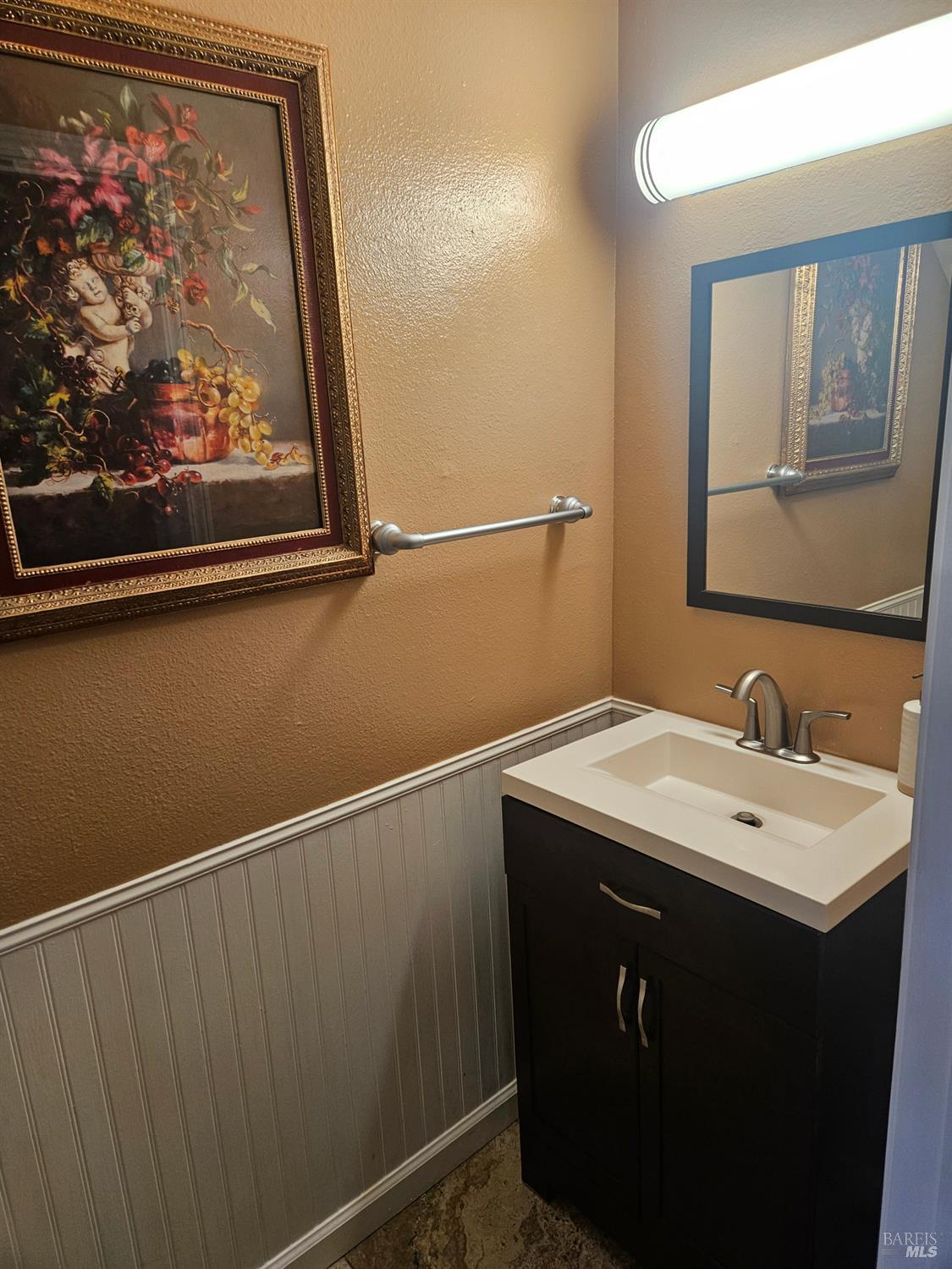 1702 Glenbrook Drive, Unit D Santa Rosa, CA 95401 - Photo 7 of 7 a bathroom with a sink vanity and mirror
