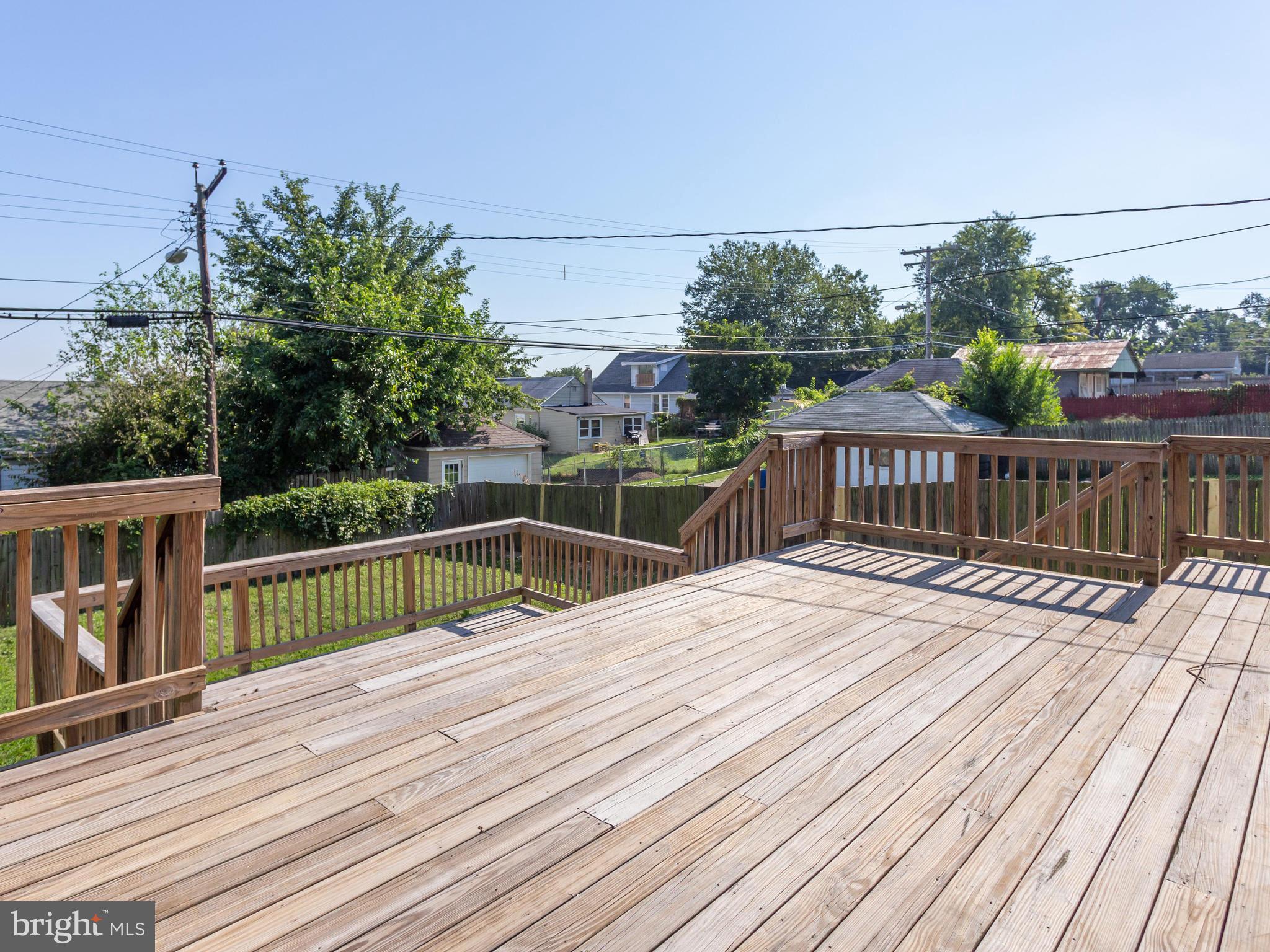 110 West Hilltop Road Baltimore, MD 21225 - Photo 28 of 30 a view of balcony with deck and wooden floor