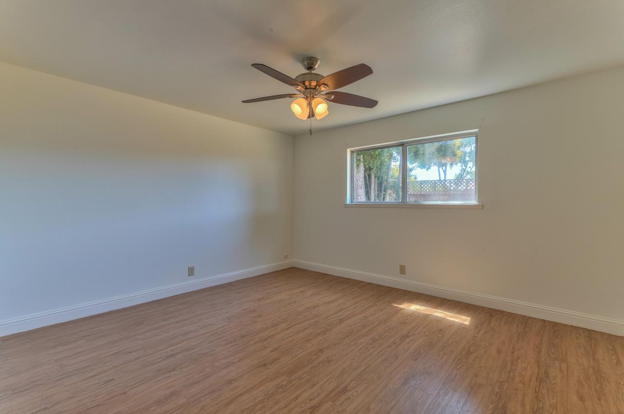 736 Sausal Drive Salinas, CA 93906 - Photo 17 of 24 wooden floor in an empty room with a window