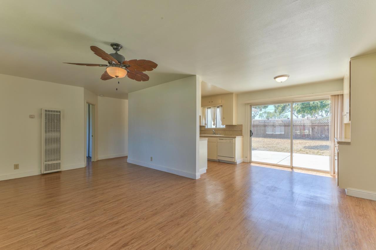 736 Sausal Drive Salinas, CA 93906 - Photo 6 of 24 a view of an empty room with wooden floor and a window
