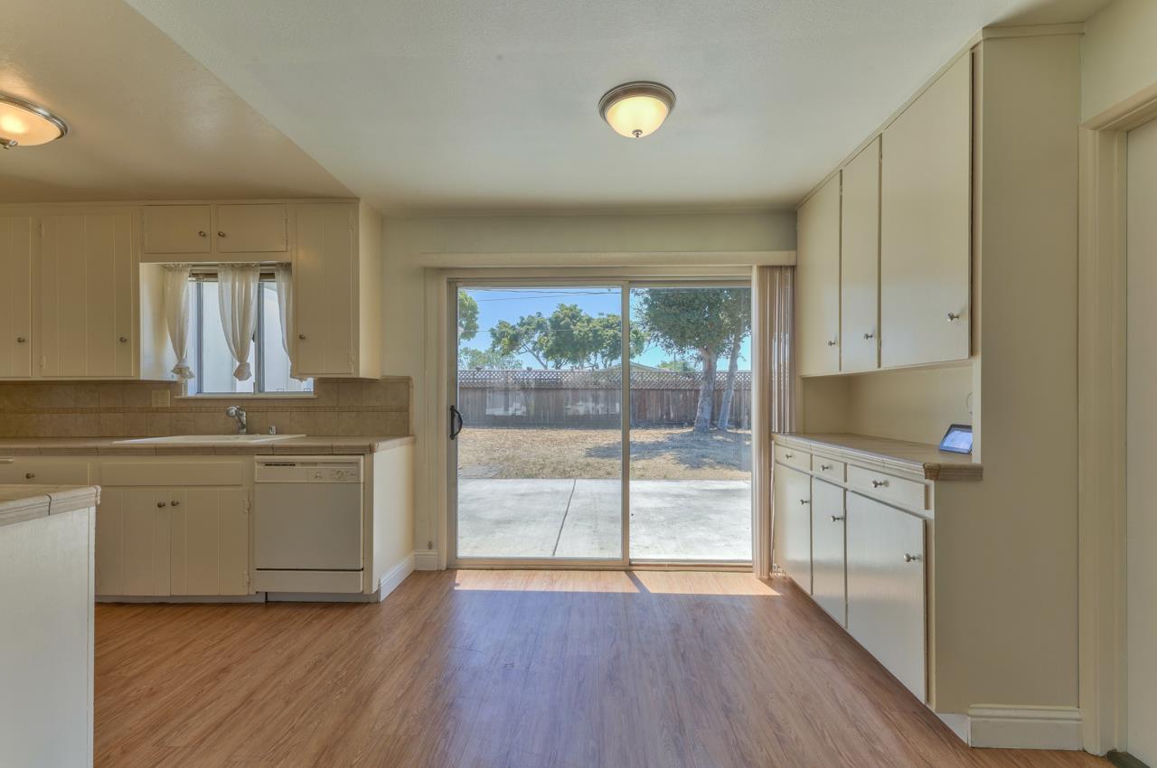 736 Sausal Drive Salinas, CA 93906 - Photo 7 of 24 a kitchen with a refrigerator and a sink