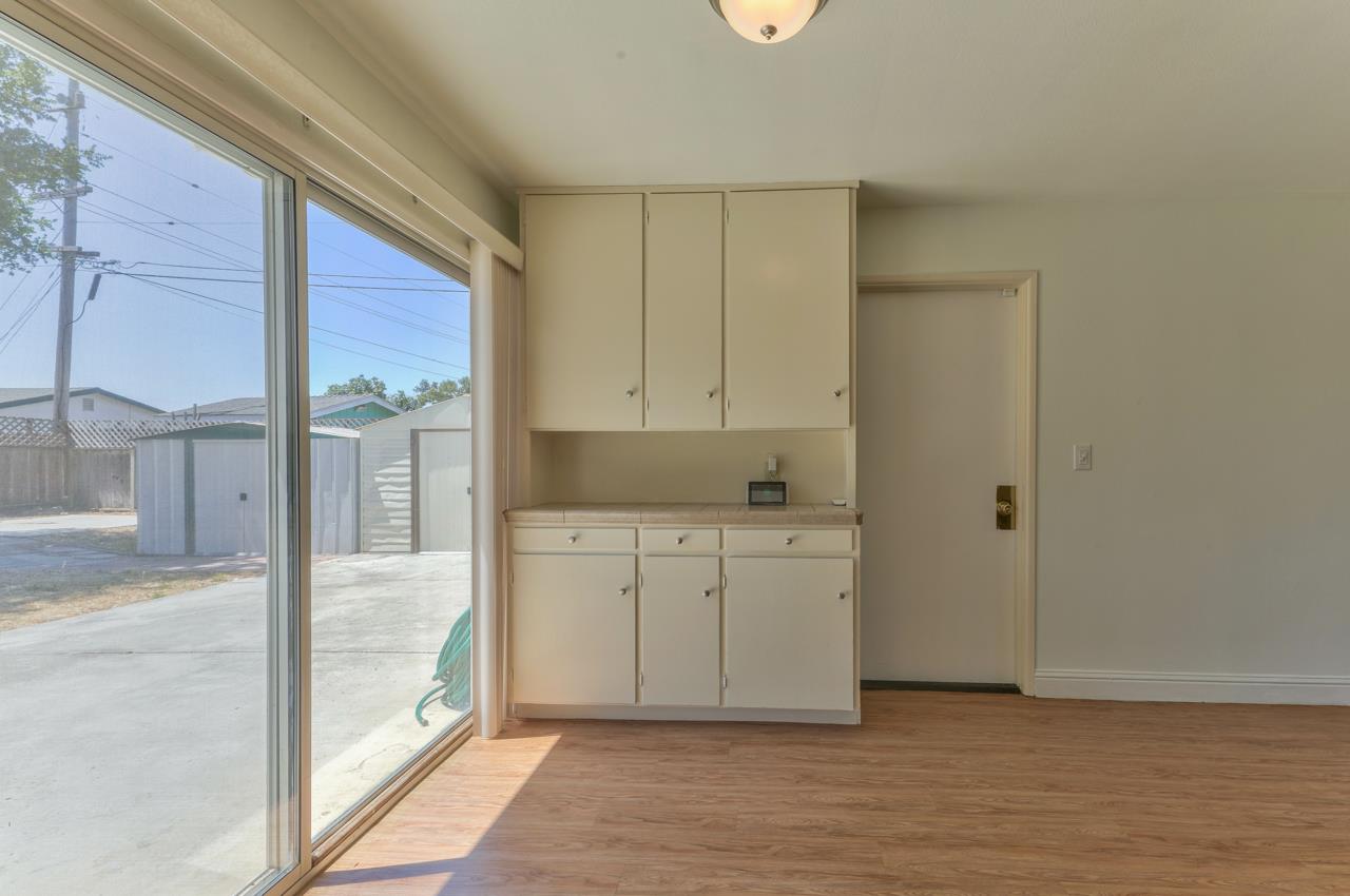 736 Sausal Drive Salinas, CA 93906 - Photo 8 of 24 a spacious bathroom with a granite countertop sink and a mirror