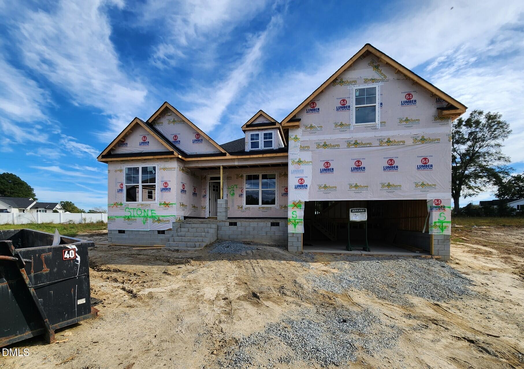 115 South Bream Court Angier, NC 27501 - Photo 2 of 7 a front view of a house with glass windows