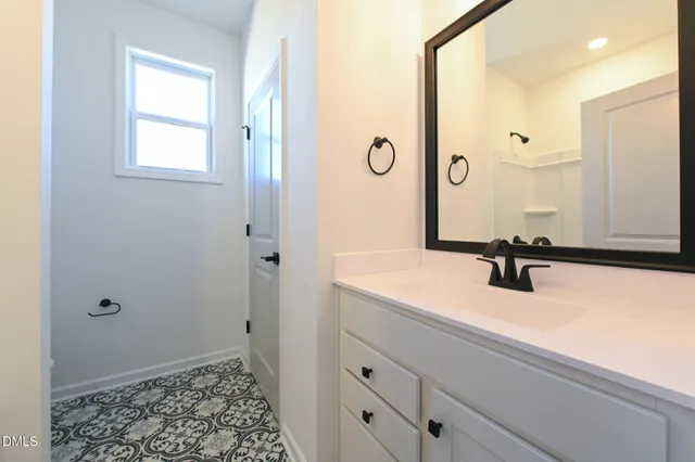 a living room with furniture and window