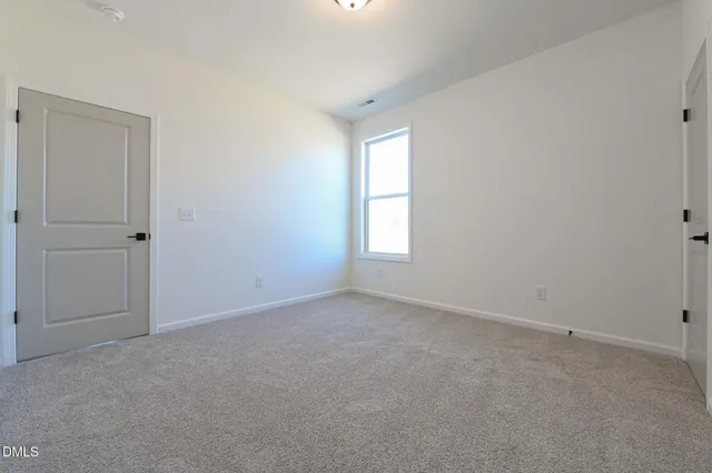 a view of a window in an empty room