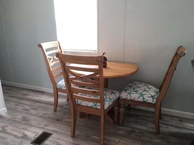 a stove top oven sitting inside of a kitchen