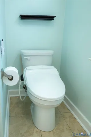 a close view of a toilet in a bathroom