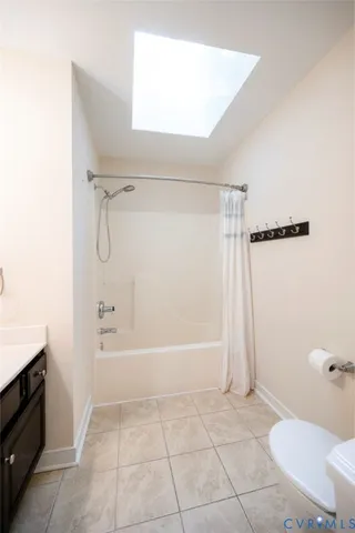 a bathroom with a sink double vanity and a mirror
