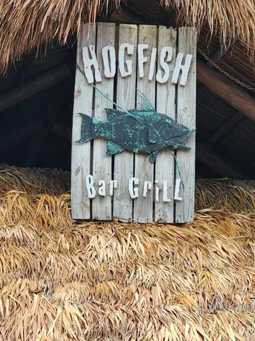 a street sign that is on a wall