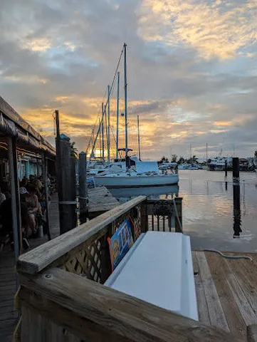 a view of a street with cars parked