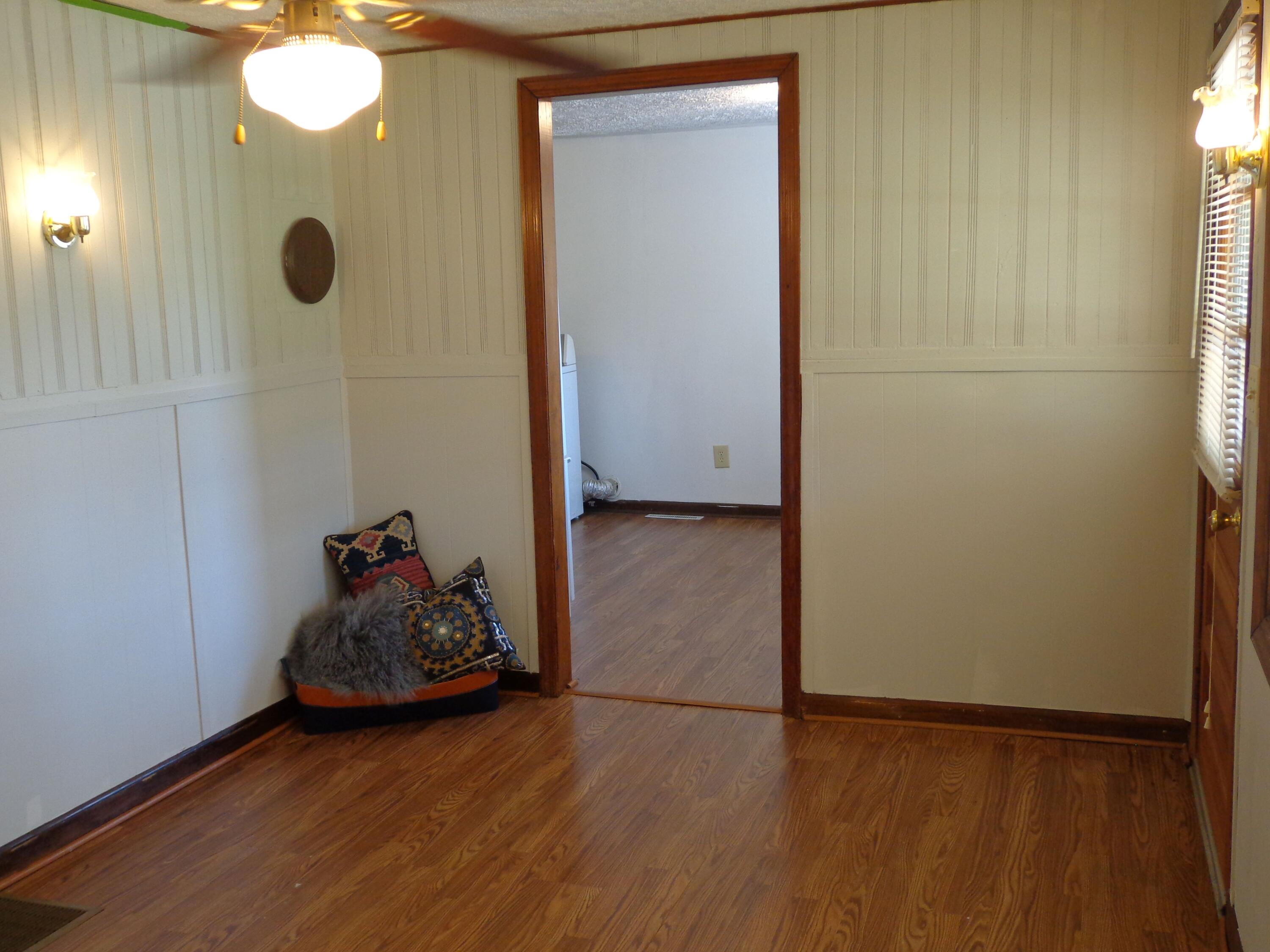 550 Hopkins Road Rocky Mount, VA 24151 - Photo 11 of 17 a view of a room with wooden floor and windows