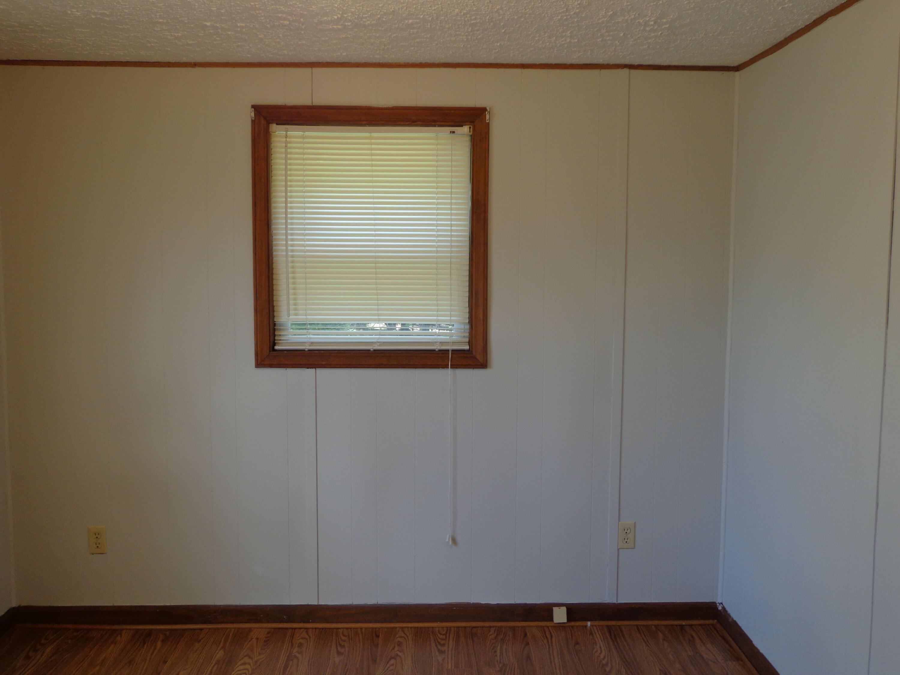 550 Hopkins Road Rocky Mount, VA 24151 - Photo 13 of 17 a view of a small space with wooden floor and a window