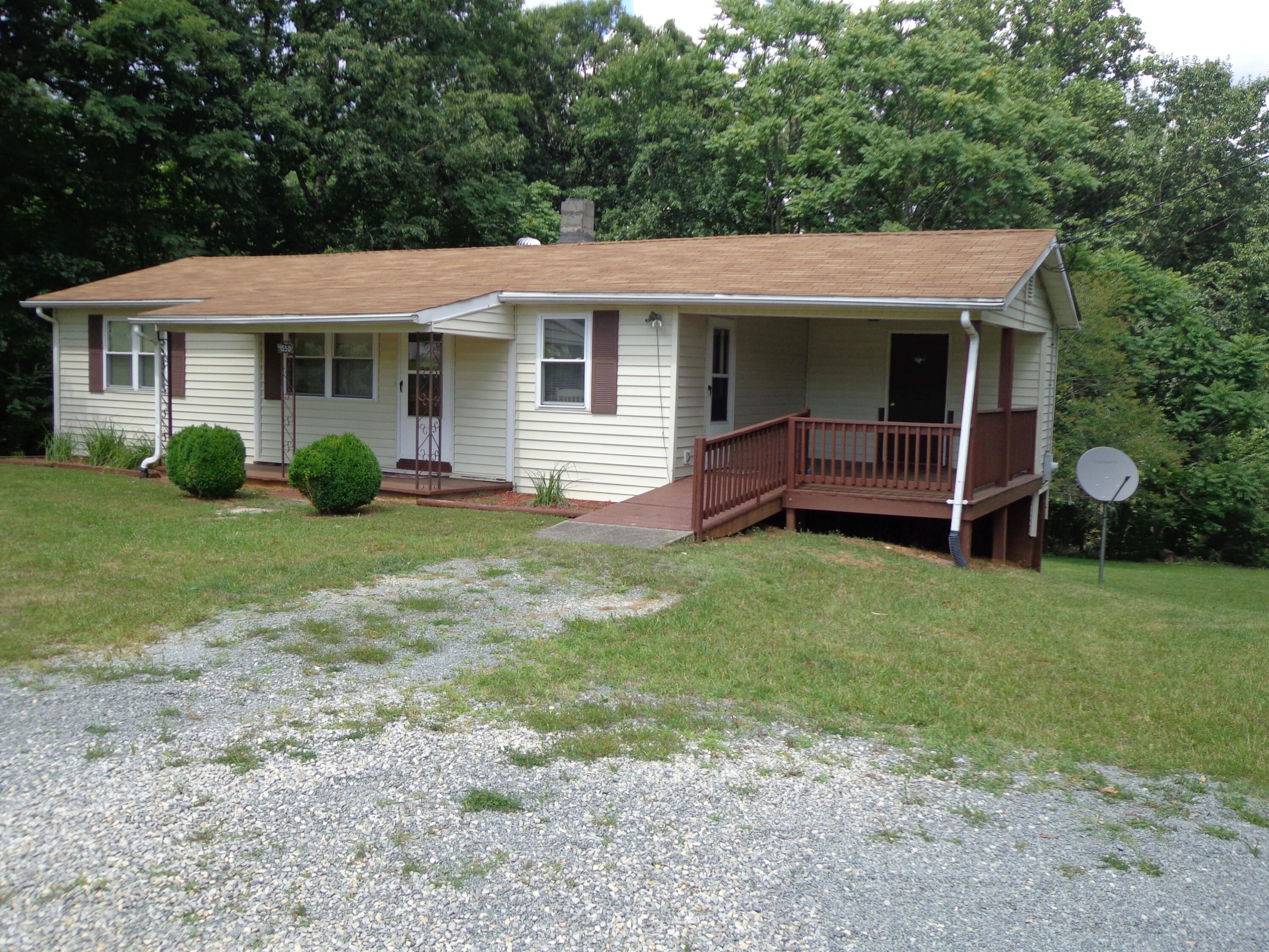 550 Hopkins Road Rocky Mount, VA 24151 - Photo 2 of 17 a view of a house with a yard and sitting area