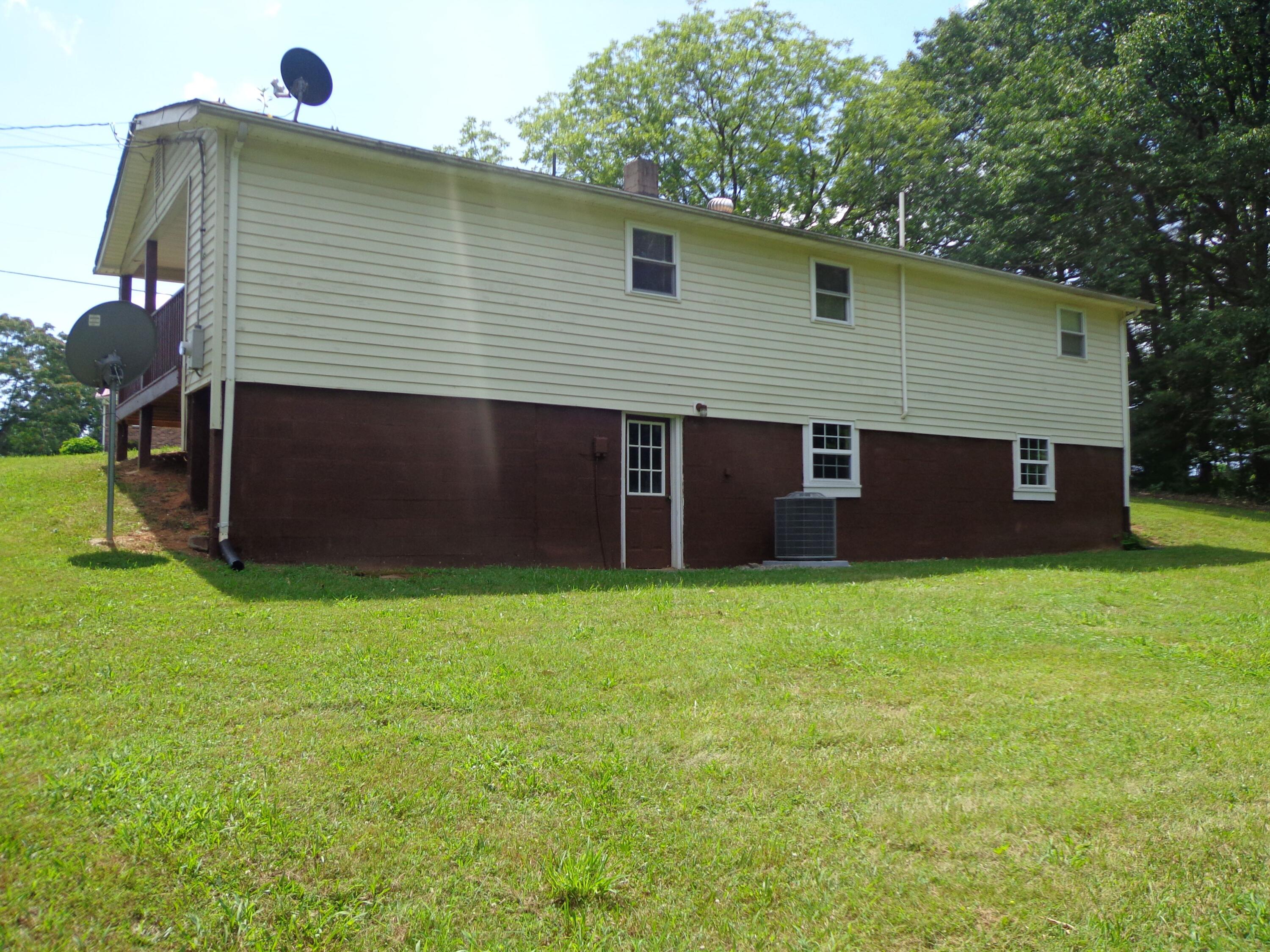 550 Hopkins Road Rocky Mount, VA 24151 - Photo 5 of 17 a front view of house with yard and green space
