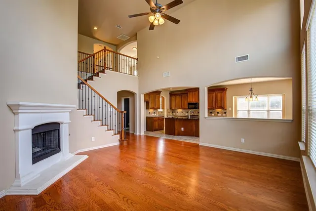 a view of livingroom with furniture fireplace and window