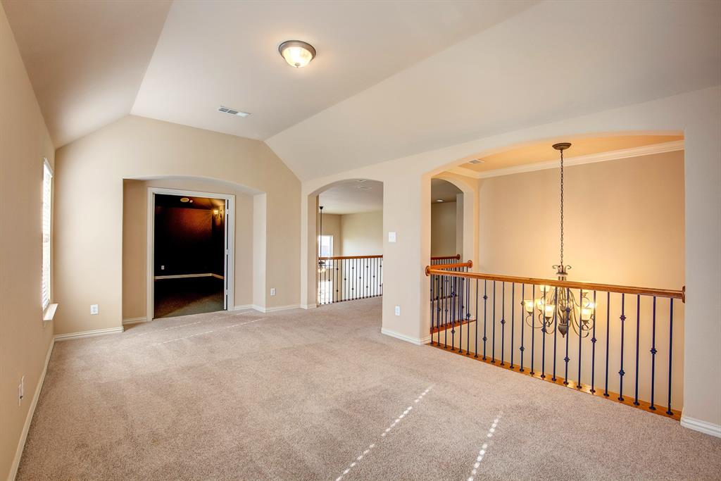 9017 Hawley Drive Fort Worth, TX 76244 - Photo 27 of 40 a view of a hallway with an entryway and an empty room