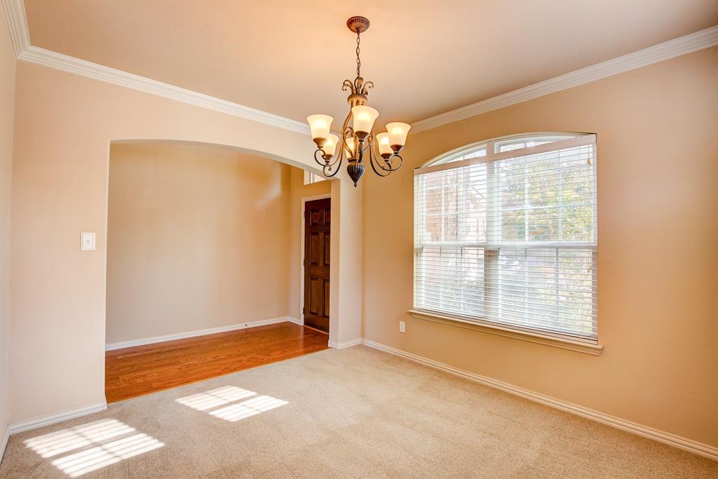 9017 Hawley Drive Fort Worth, TX 76244 - Photo 9 of 40 a view of a room with window and chandelier