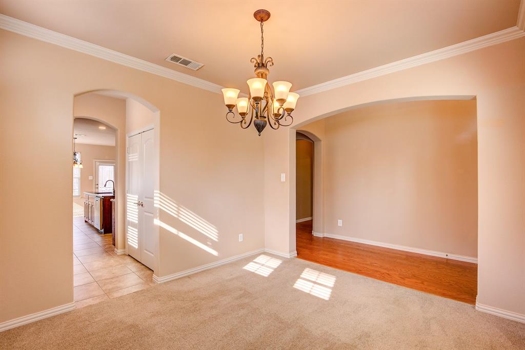 9017 Hawley Drive Fort Worth, TX 76244 - Photo 10 of 40 a view of a chandelier in big room and a chandelier