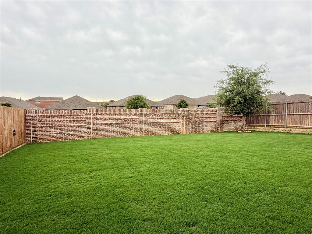 2328 Briscoe Rnch Drive Weatherford, TX 76087 - Photo 28 of 36 Gorgeous brick fence along the back