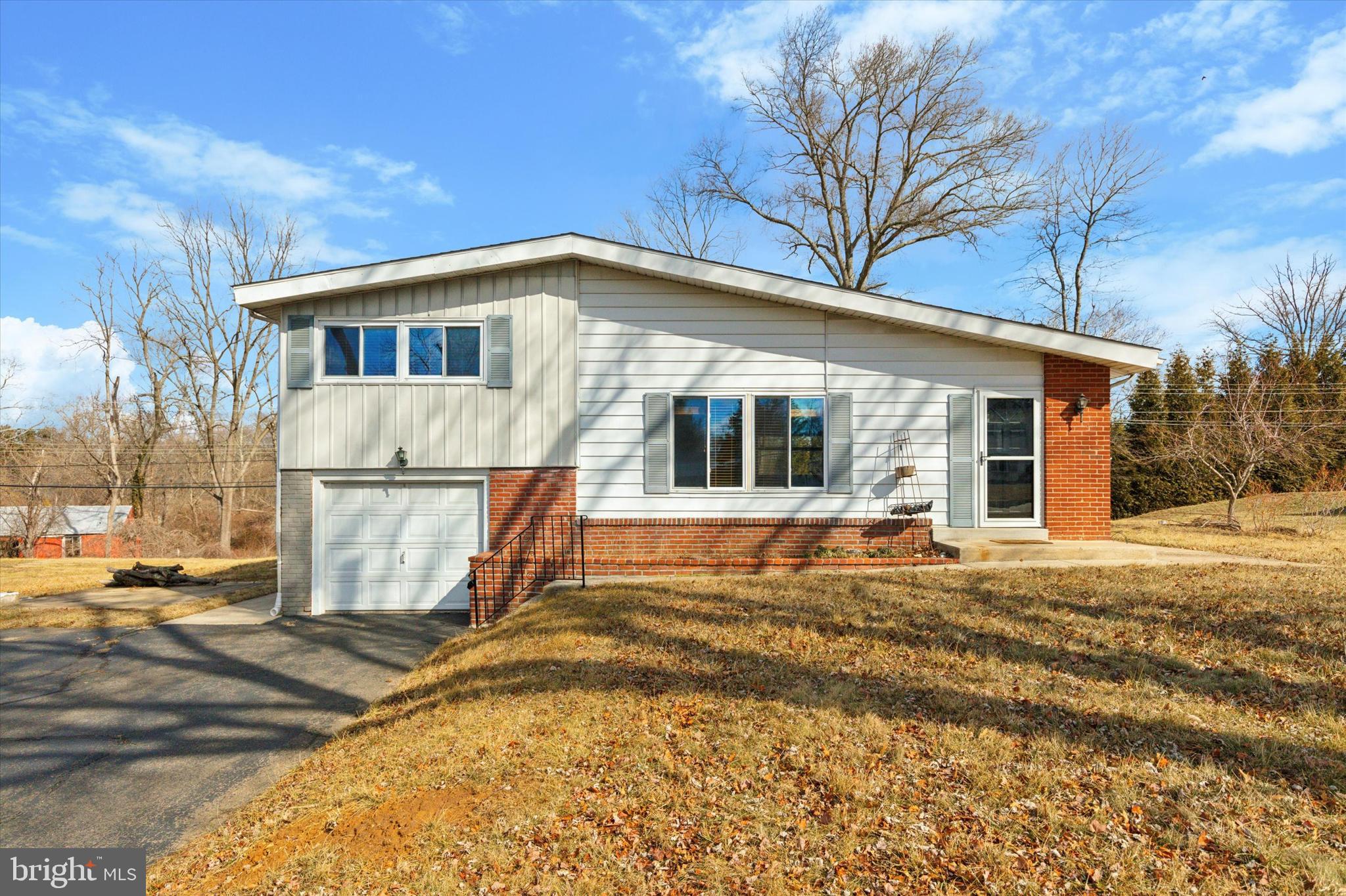 1633 Pulaski Drive Blue Bell, PA 19422 - Photo 1 of 13 a view of a house with snow on the background