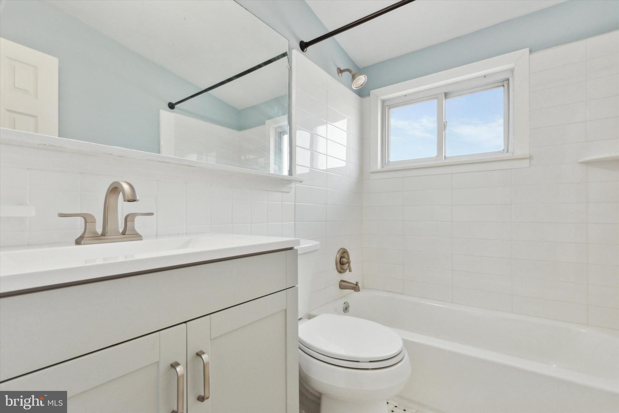 1633 Pulaski Drive Blue Bell, PA 19422 - Photo 11 of 13 a bathroom with a sink a toilet and a bathtub