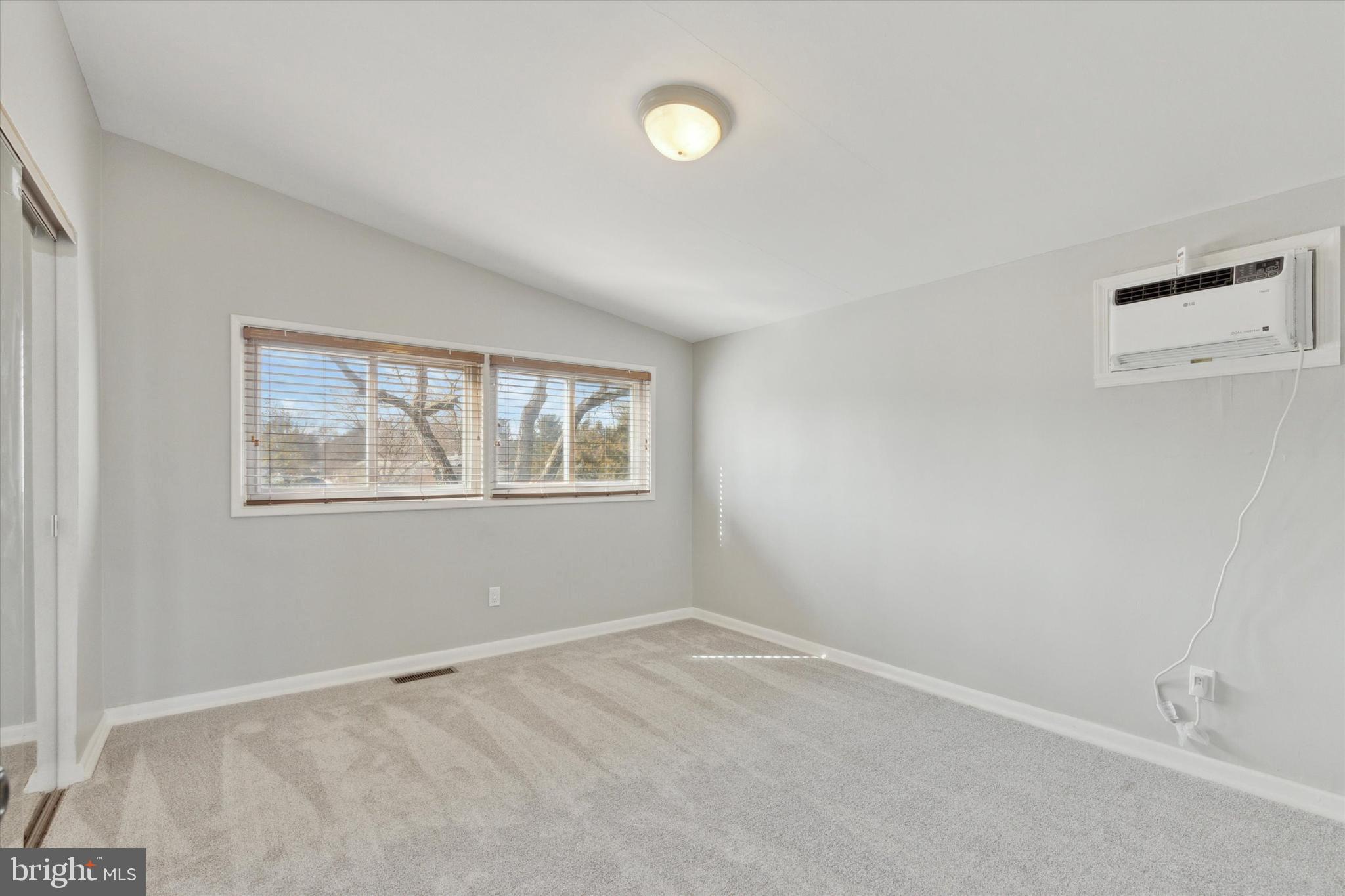 1633 Pulaski Drive Blue Bell, PA 19422 - Photo 10 of 13 an empty room with windows and closet