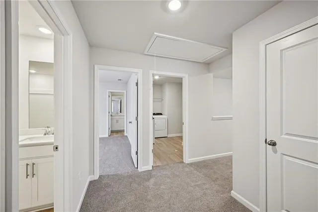 a bathroom with a granite countertop sink a toilet and a mirror