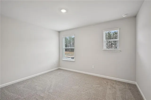wooden floor and cabinet in an empty room