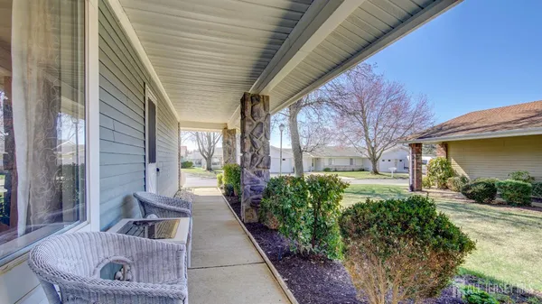 a house view with couches in the patio
