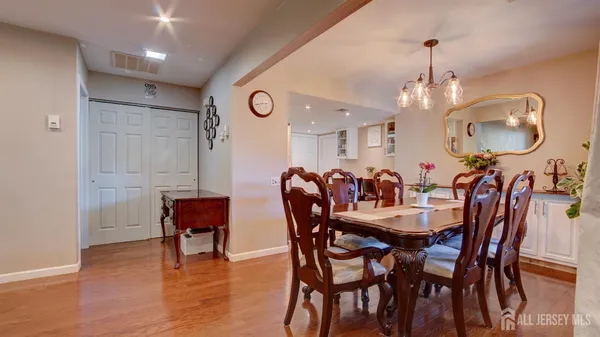 a view of a dining room with furniture