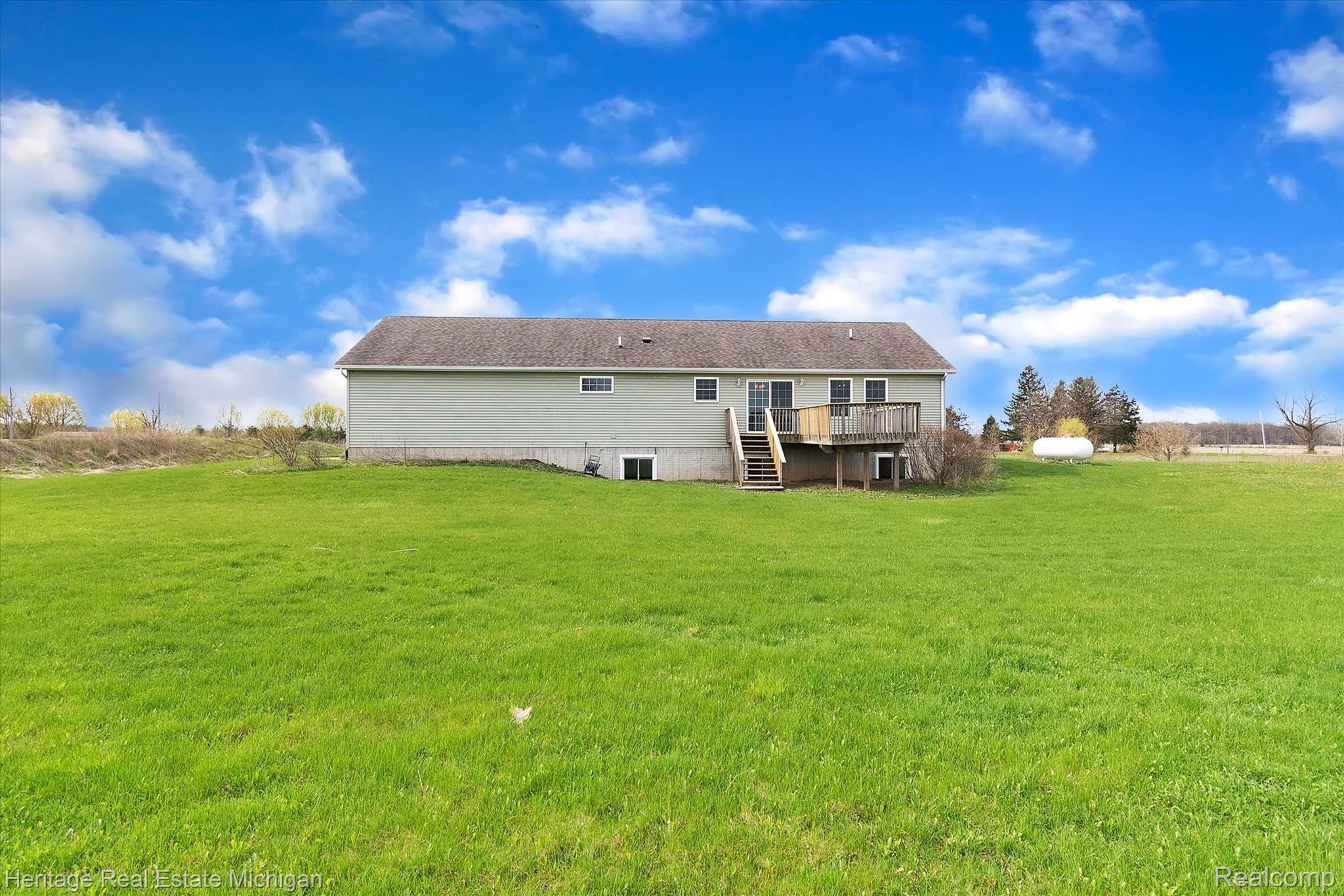 2730 Krouse Road Owosso, MI 48867 - Photo 40 of 45 Back view of home