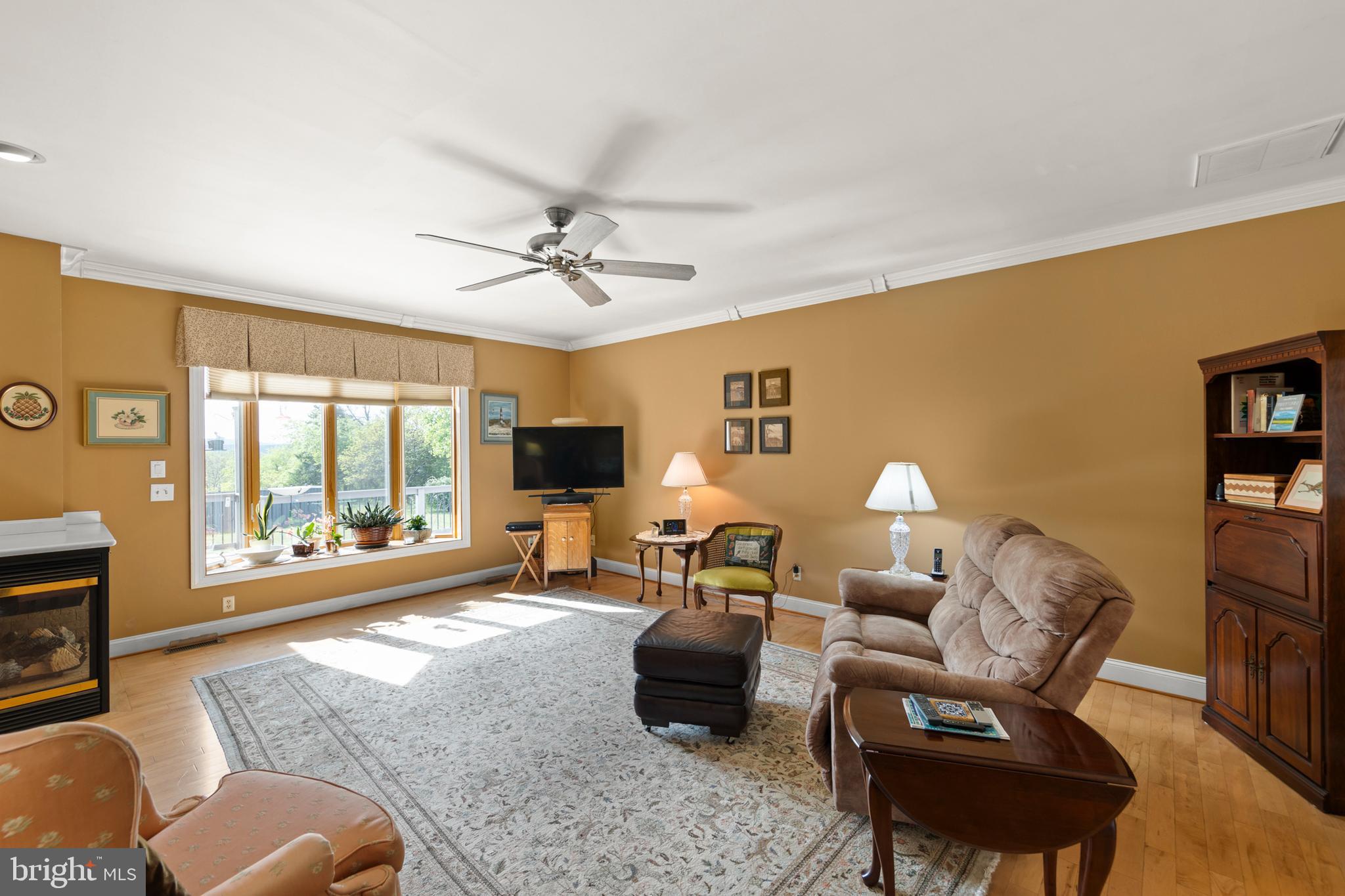 237 Aspen Trail Winchester, VA 22602 - Photo 12 of 69 a living room with furniture and a flat screen tv