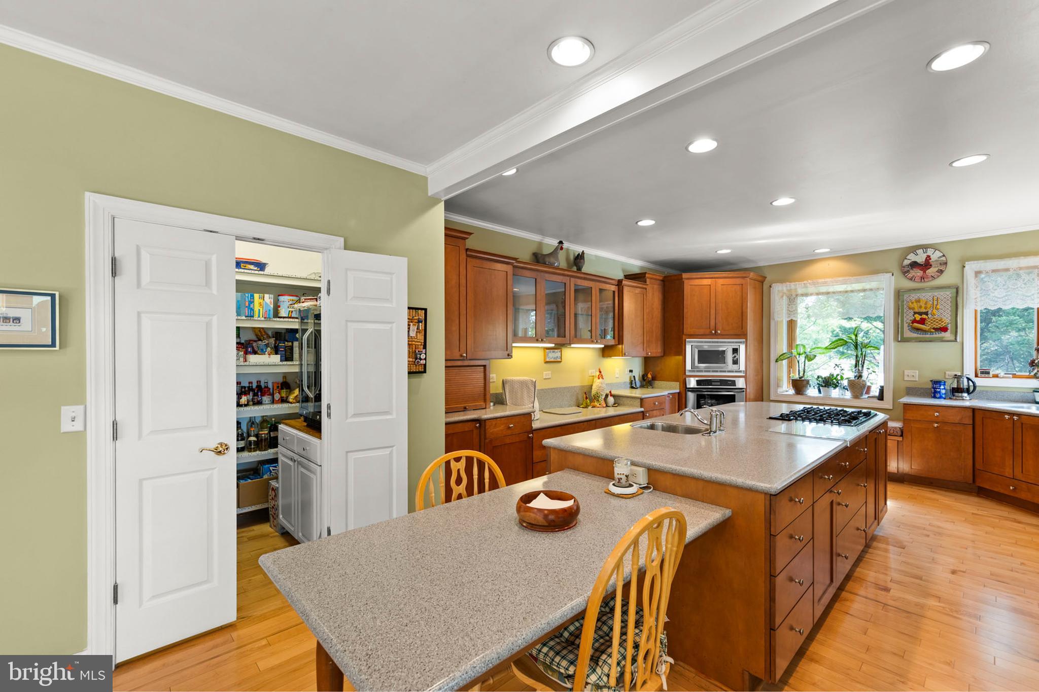 237 Aspen Trail Winchester, VA 22602 - Photo 15 of 69 a view of a dining room with furniture window and wooden floor