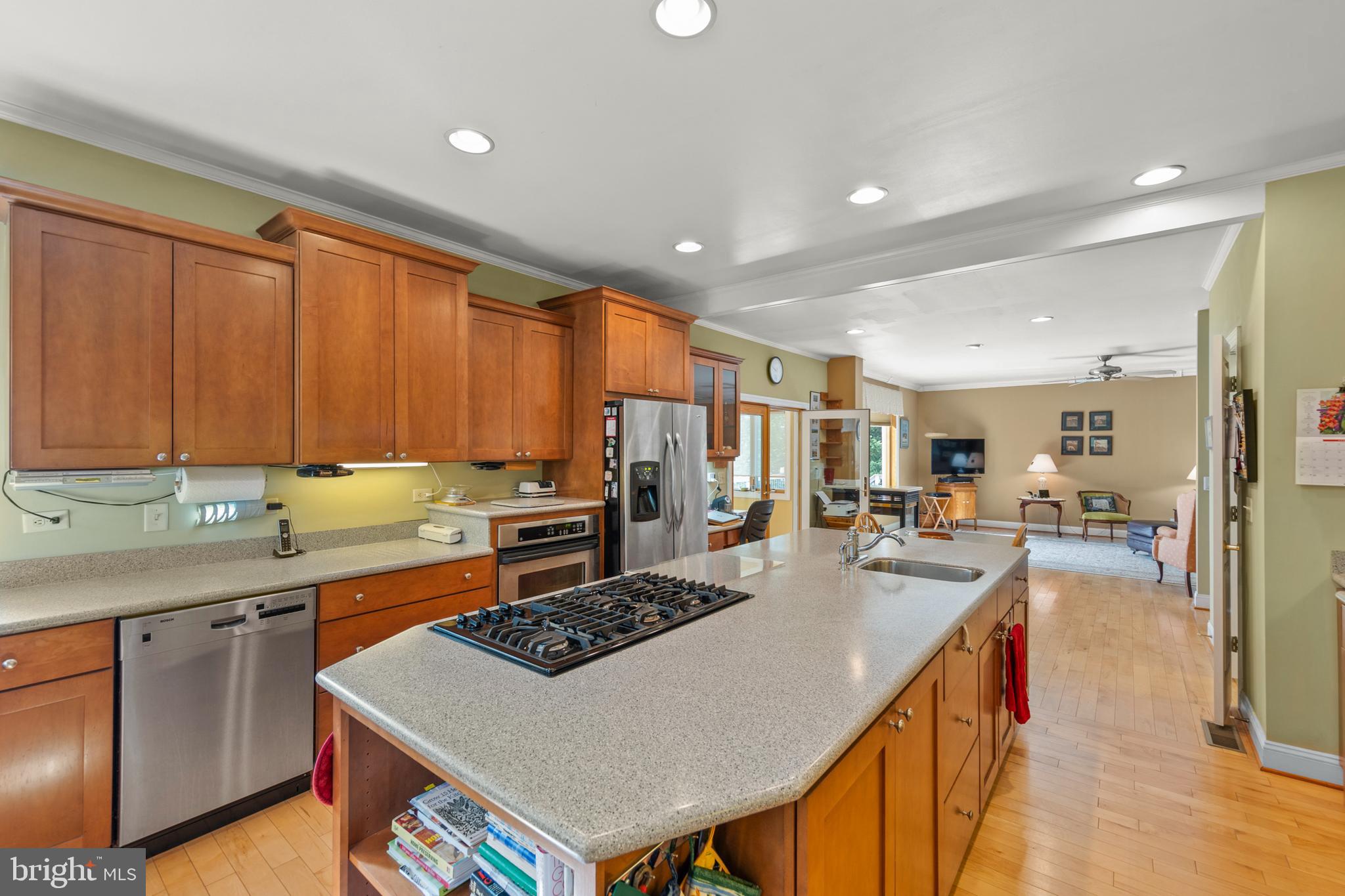 237 Aspen Trail Winchester, VA 22602 - Photo 18 of 69 a kitchen with stainless steel appliances granite countertop a stove a sink dishwasher and a refrigerator with wooden floor