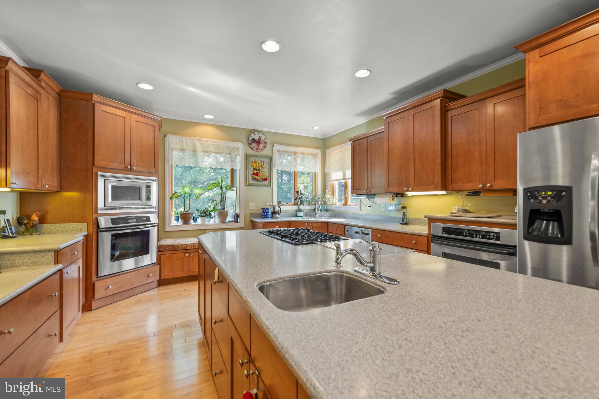 237 Aspen Trail Winchester, VA 22602 - Photo 20 of 69 a kitchen with stainless steel appliances granite countertop a sink stove and refrigerator