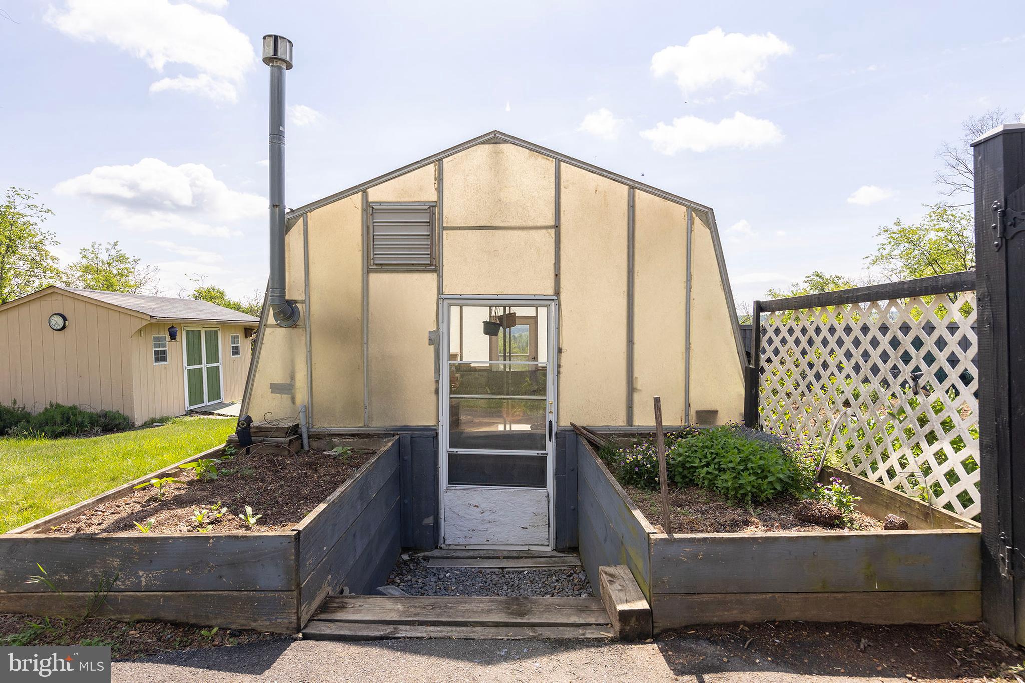 237 Aspen Trail Winchester, VA 22602 - Photo 3 of 69 a front view of a house with garden