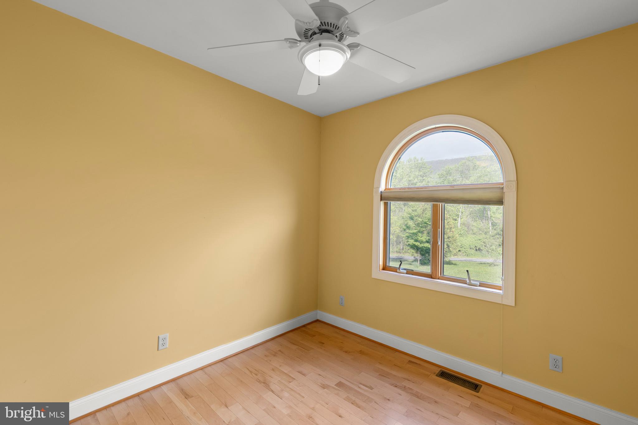 237 Aspen Trail Winchester, VA 22602 - Photo 31 of 69 a view of room with window and ceiling fan