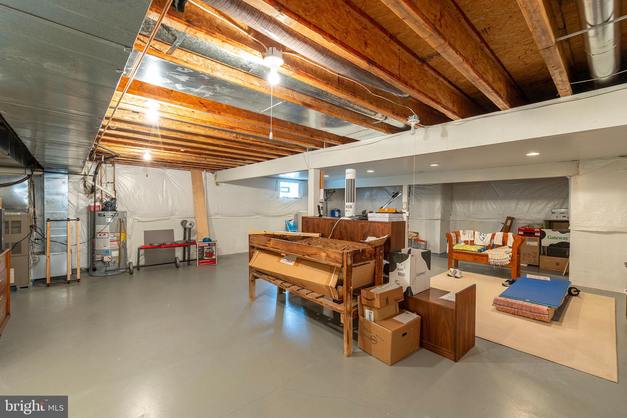 237 Aspen Trail Winchester, VA 22602 - Photo 38 of 69 a living room with furniture and a chandelier